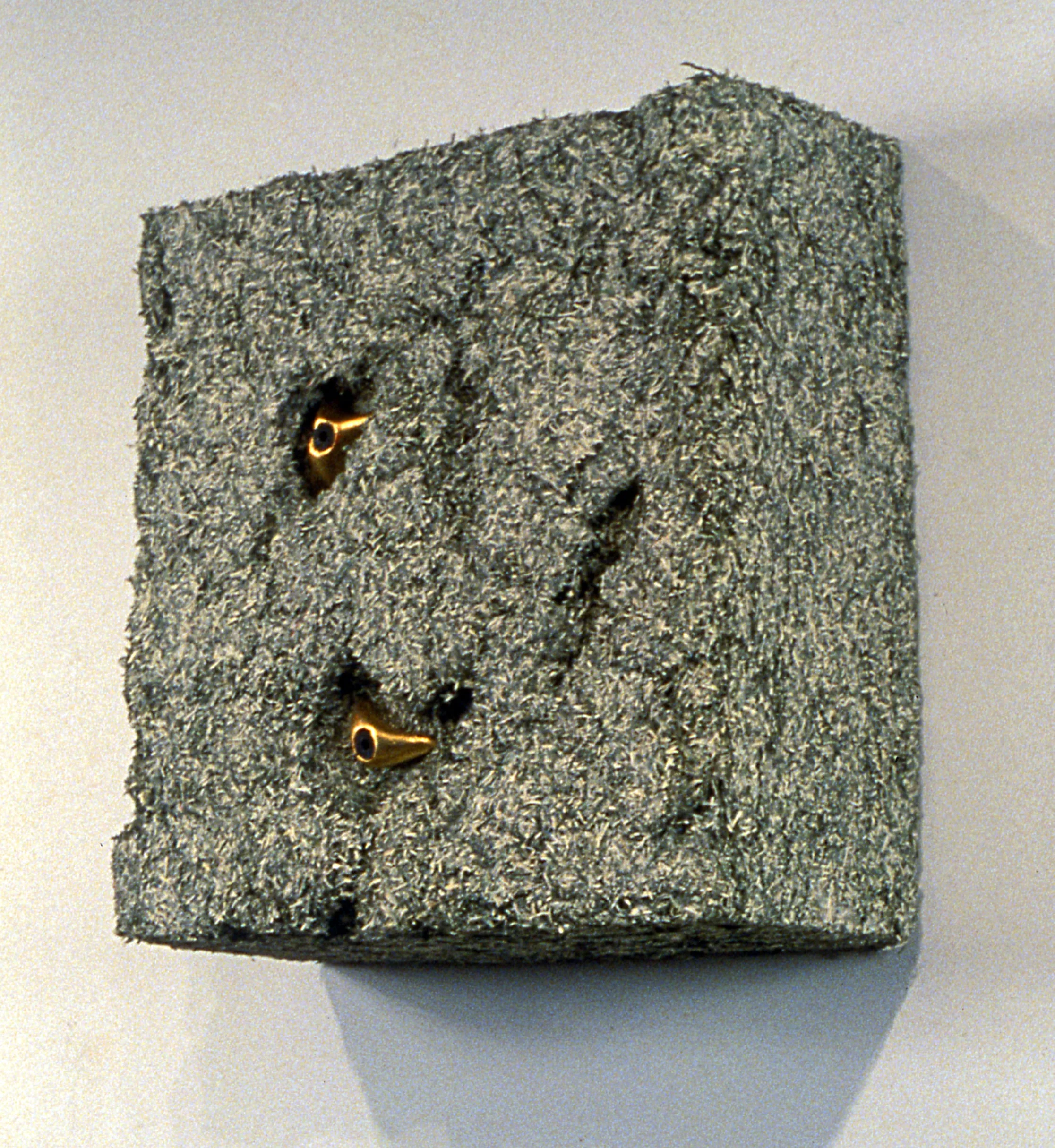       Extreme II , 2001, 24” x 24” x 6” shredded currency, plated climbing grips   