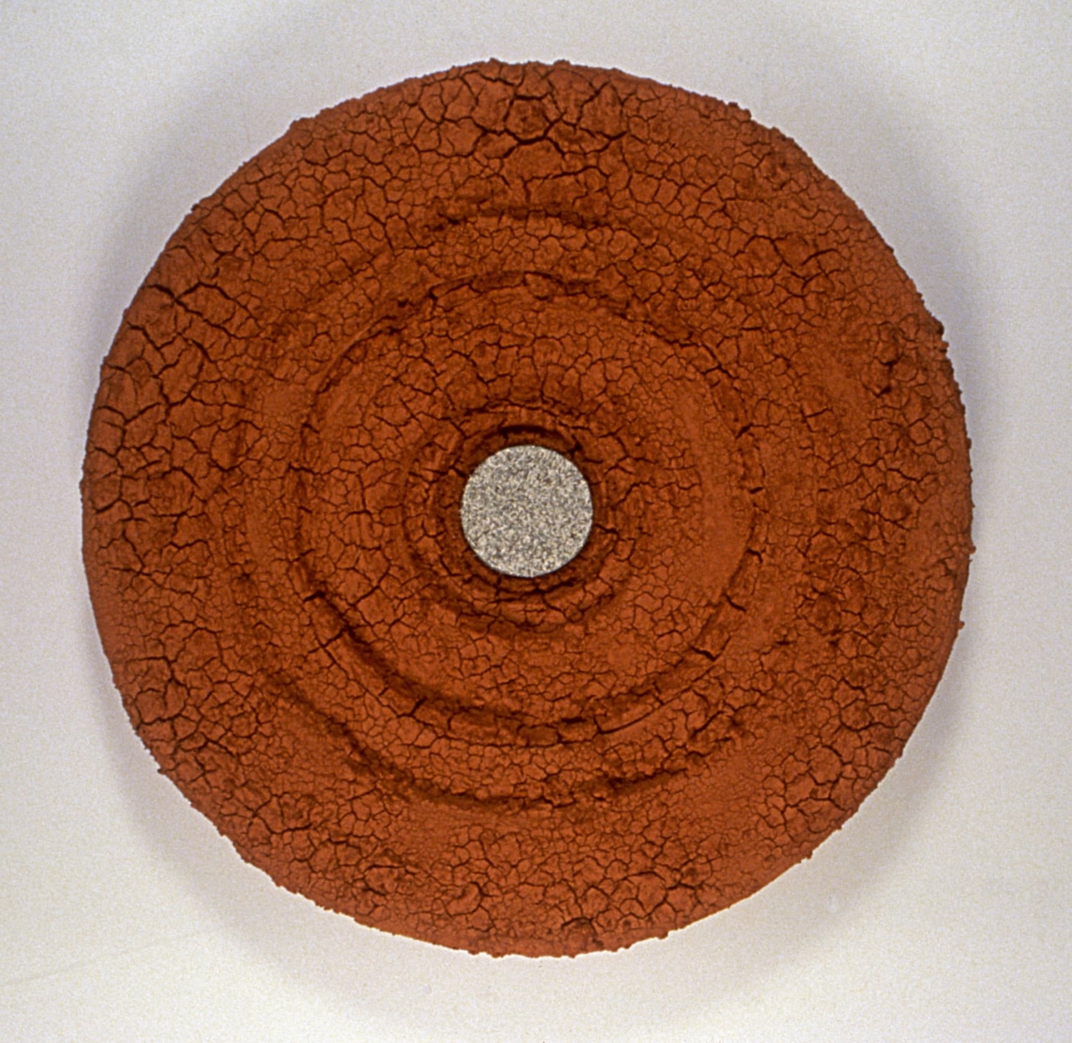Goal , 2000, 62” x 62” x 7”, mixed media, clay, US shredded currency