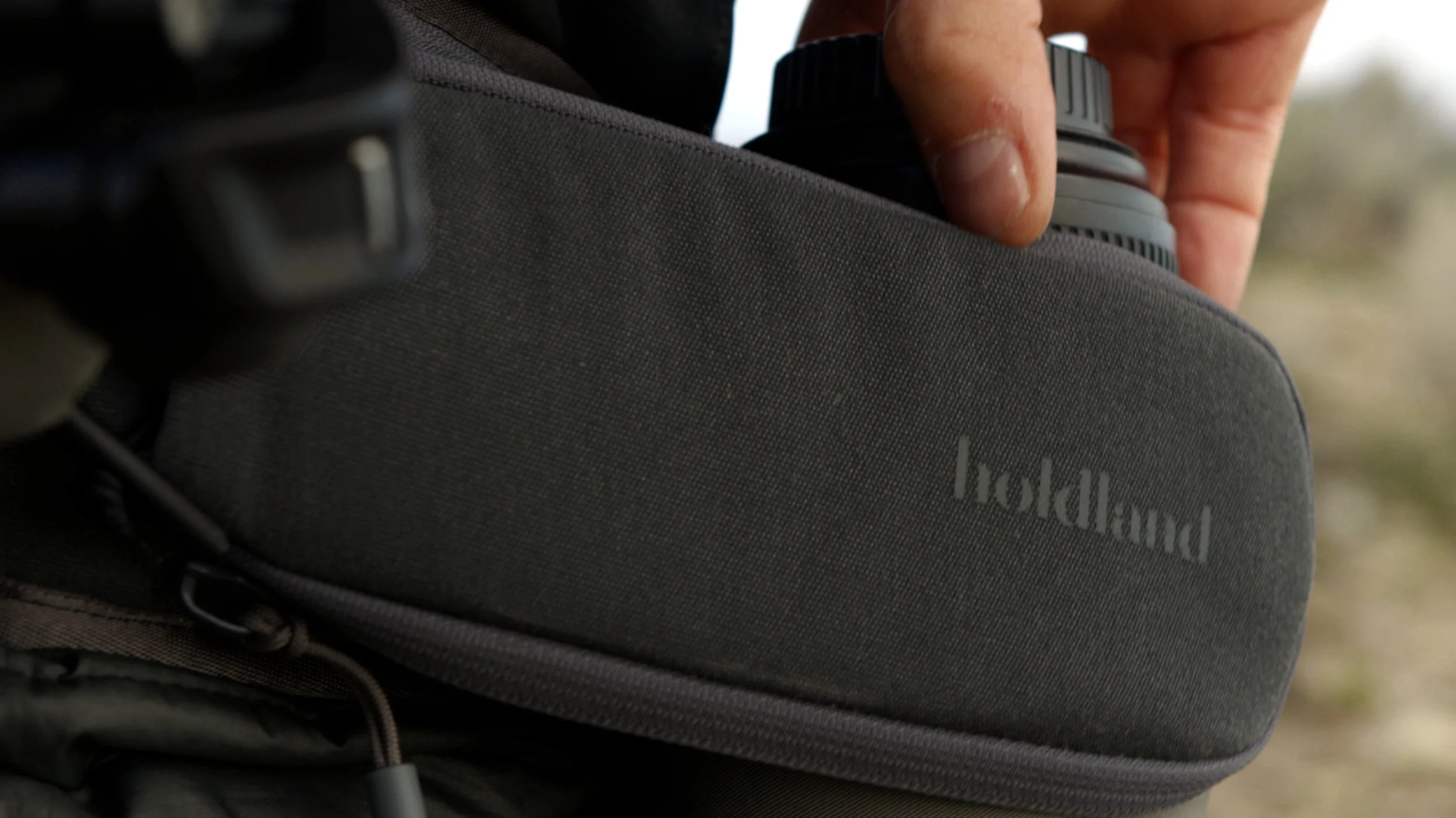 Holdland backpack detail waist strap logo
