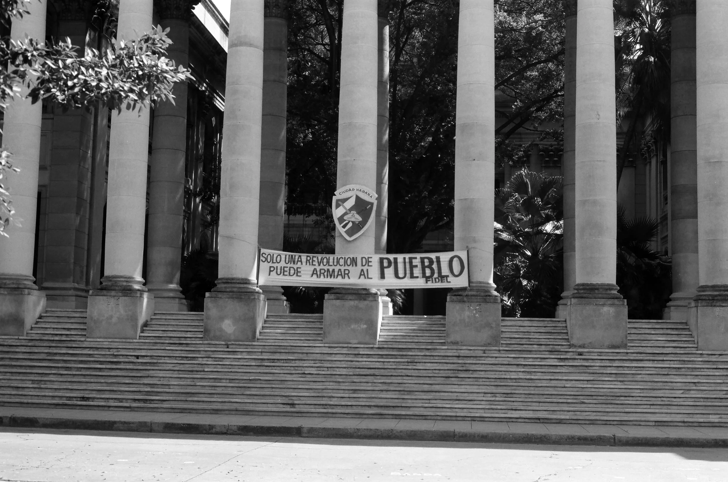 Banner at the University of Habana, "Only the revolution of a village can arm a village." 