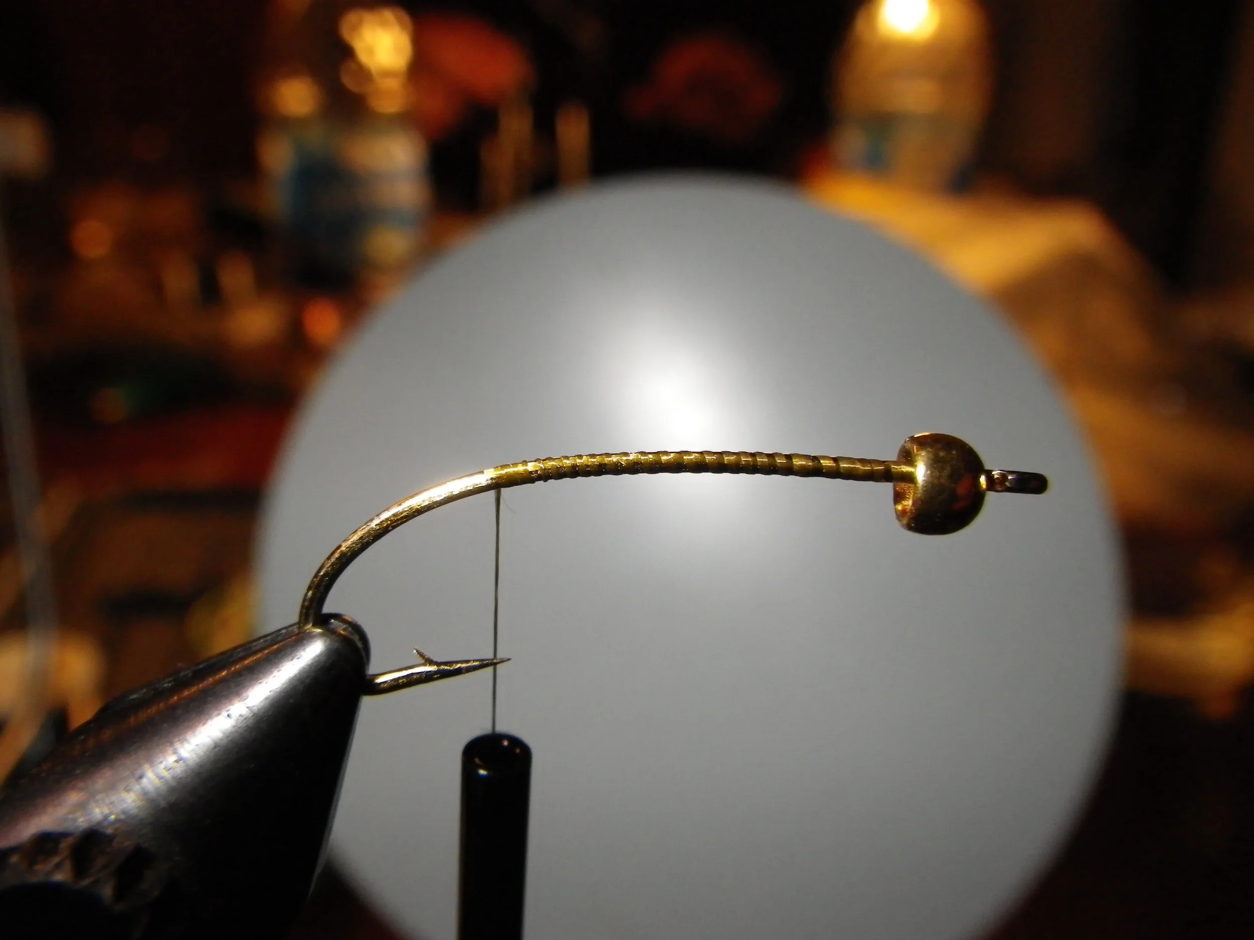 Mount bead on hook Attach thread Wrap back to a point over the hook eye