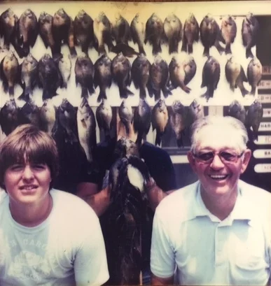 My granddaddy and me with a truckload full of bedding bream caught at the cow pasture about 40 years ago.