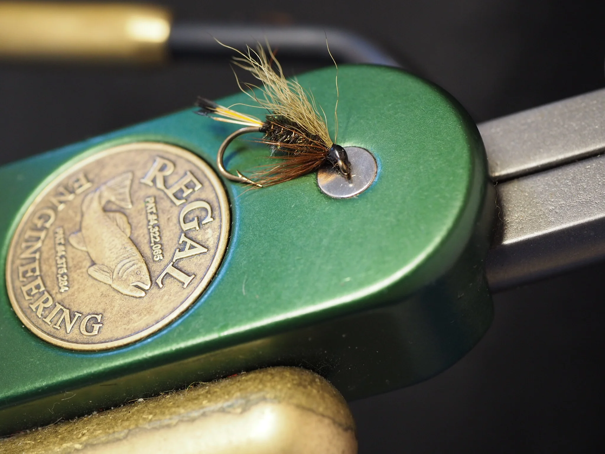 Olive wing, peacock herl body, golden pheasant tippet tail