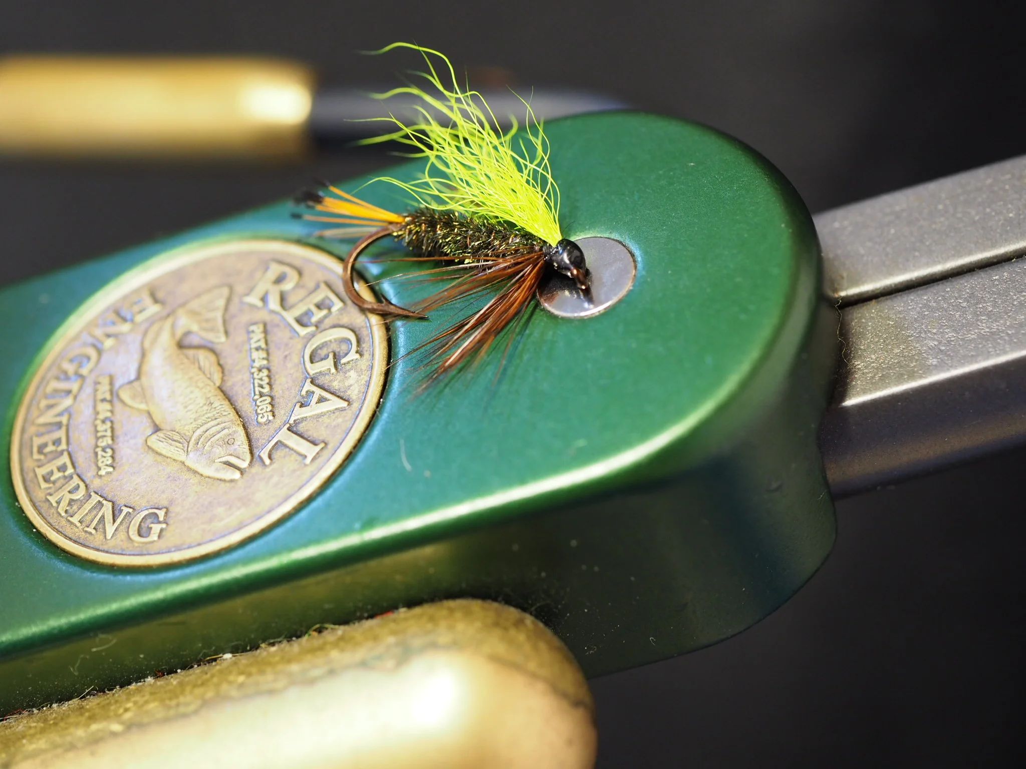 Yellow wing, peacock herl body, golden pheasant tippet tail