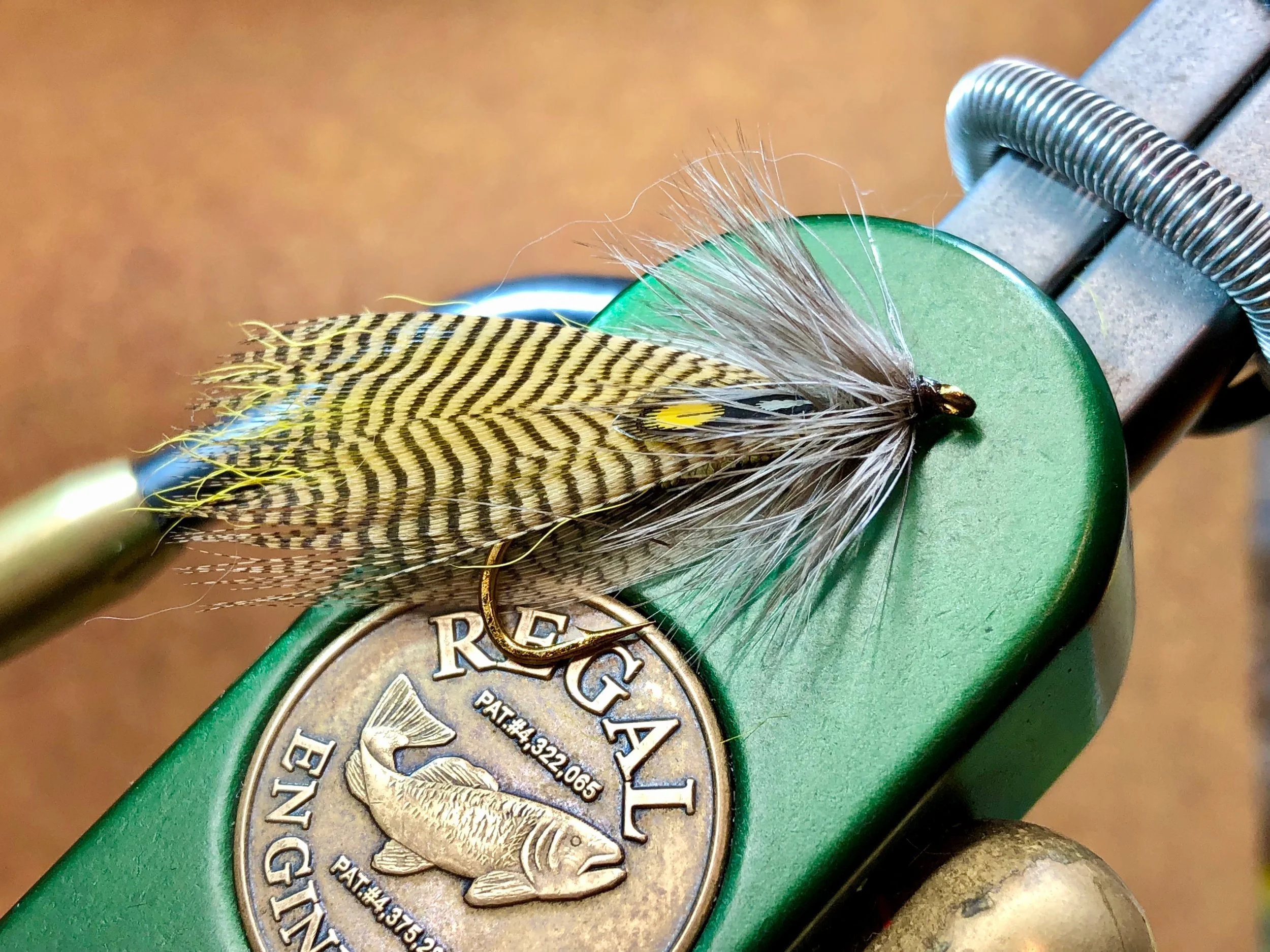 A Hornberg Streamer with a wood duck flank feathers and artificial jungle cock eyes.