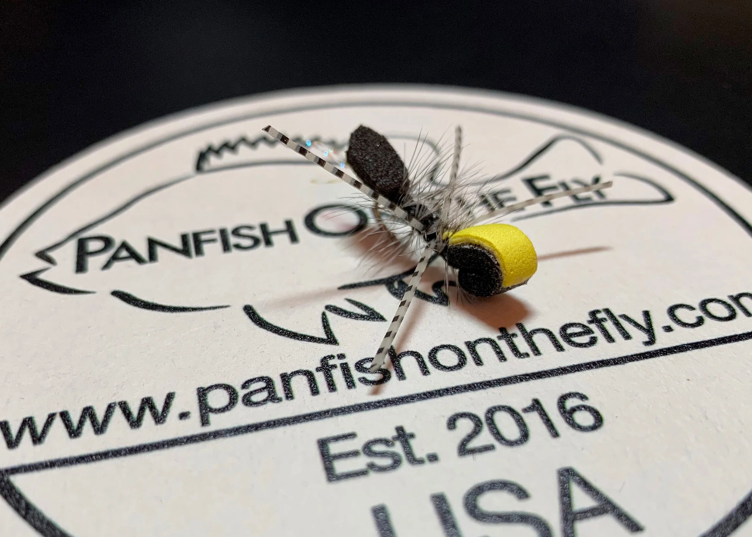 A black Micro Gurgler with a yellow indicator.