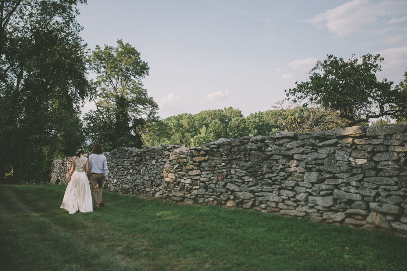 bride and groom steppingstone museum walking away.jpg