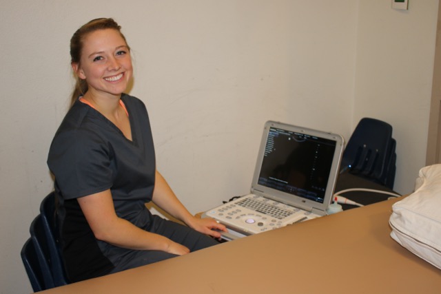 Jo White, a Stanton staff sonographer, prepares for the ultrasound machine's debut.