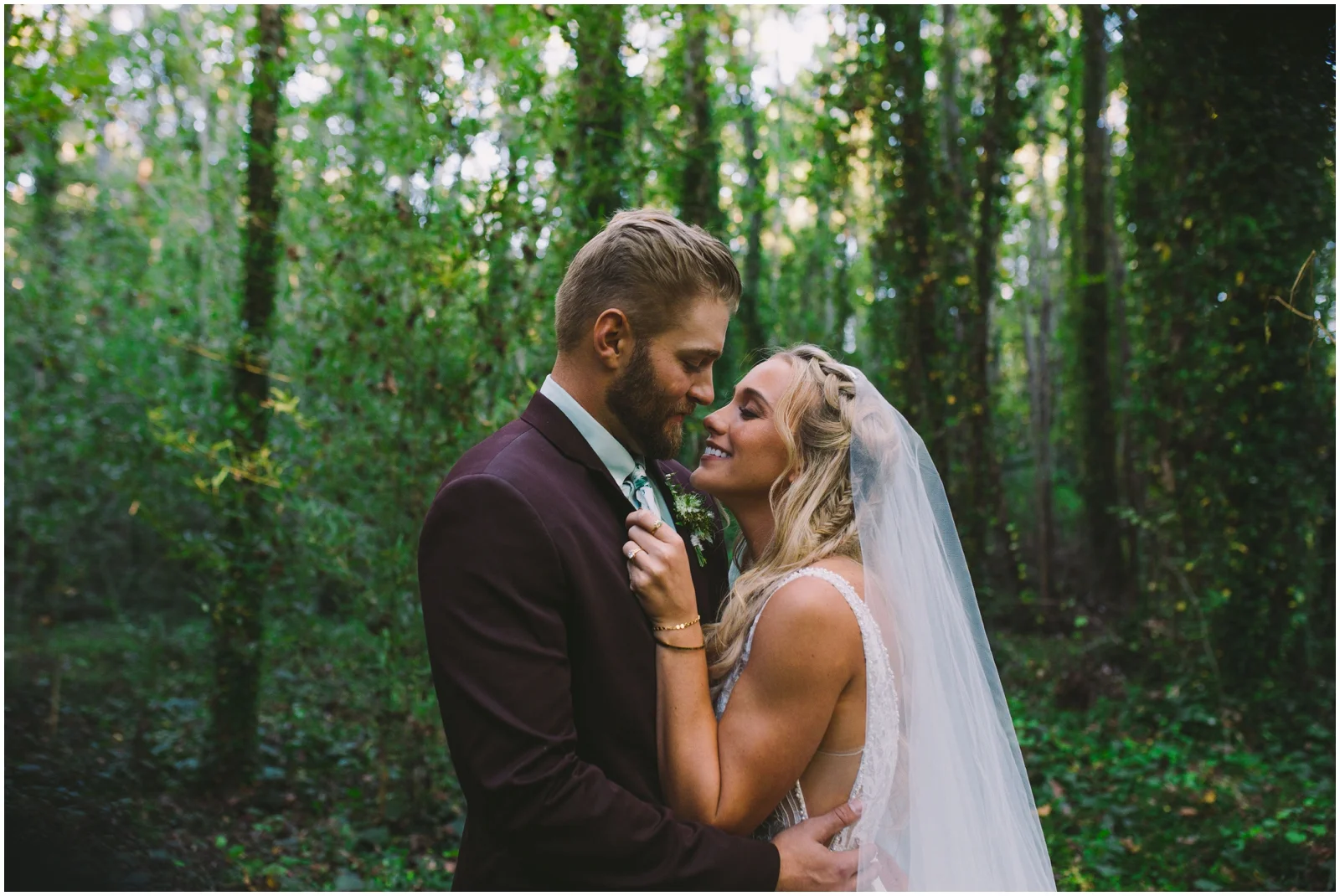 Bride and groom in the woods