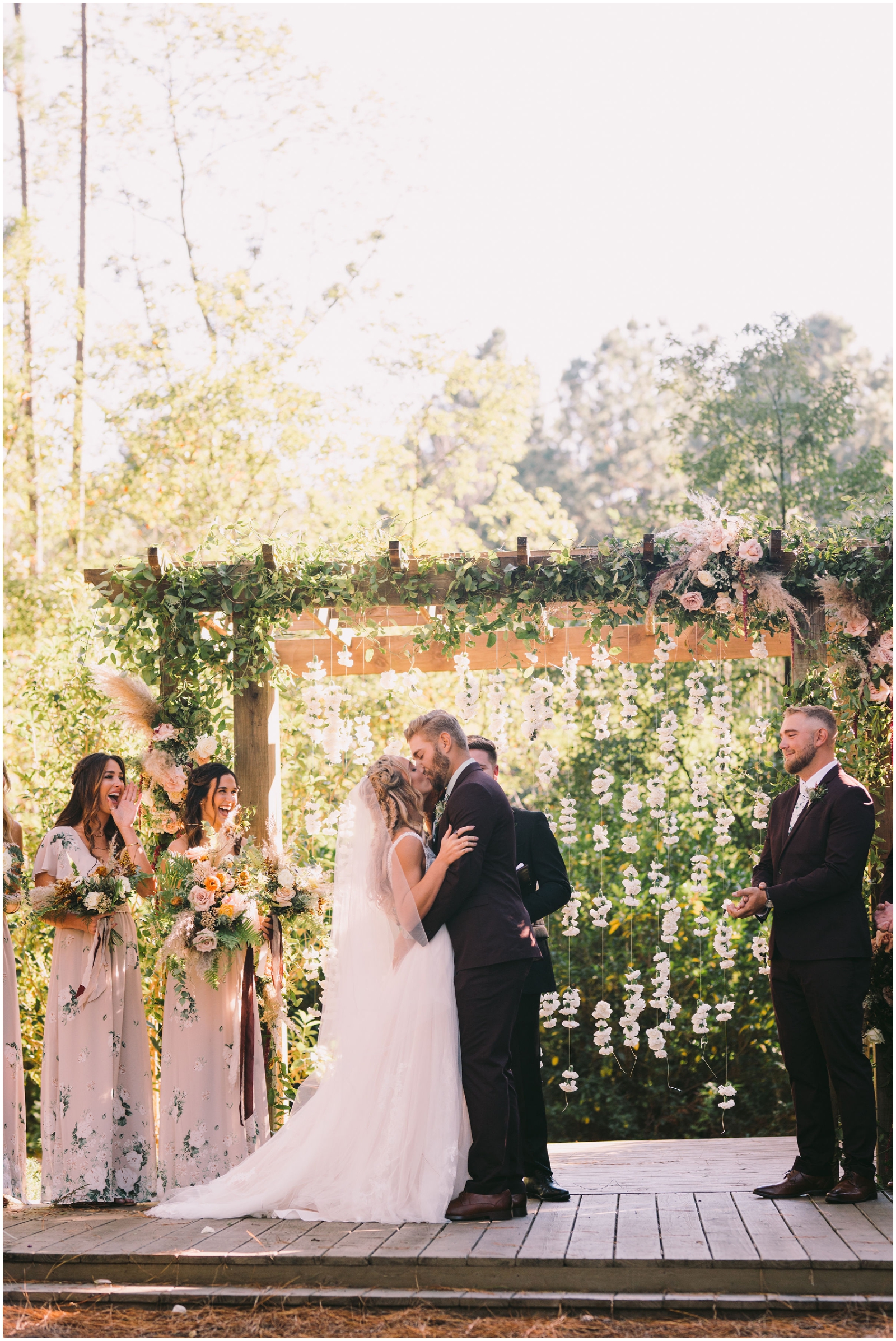  Bride and Groom kiss at the ceremony 