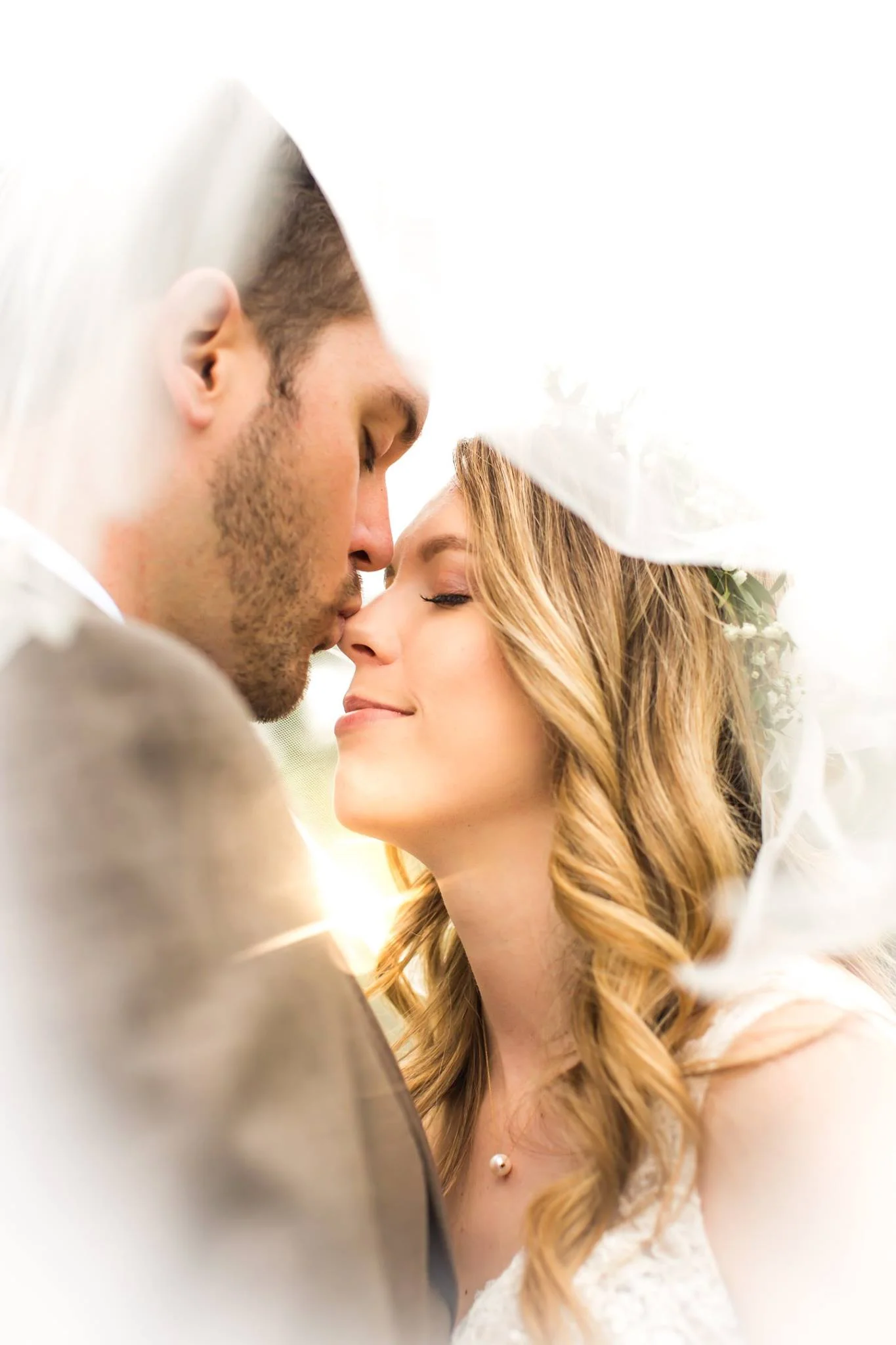  bride and groom portrait under the veil 