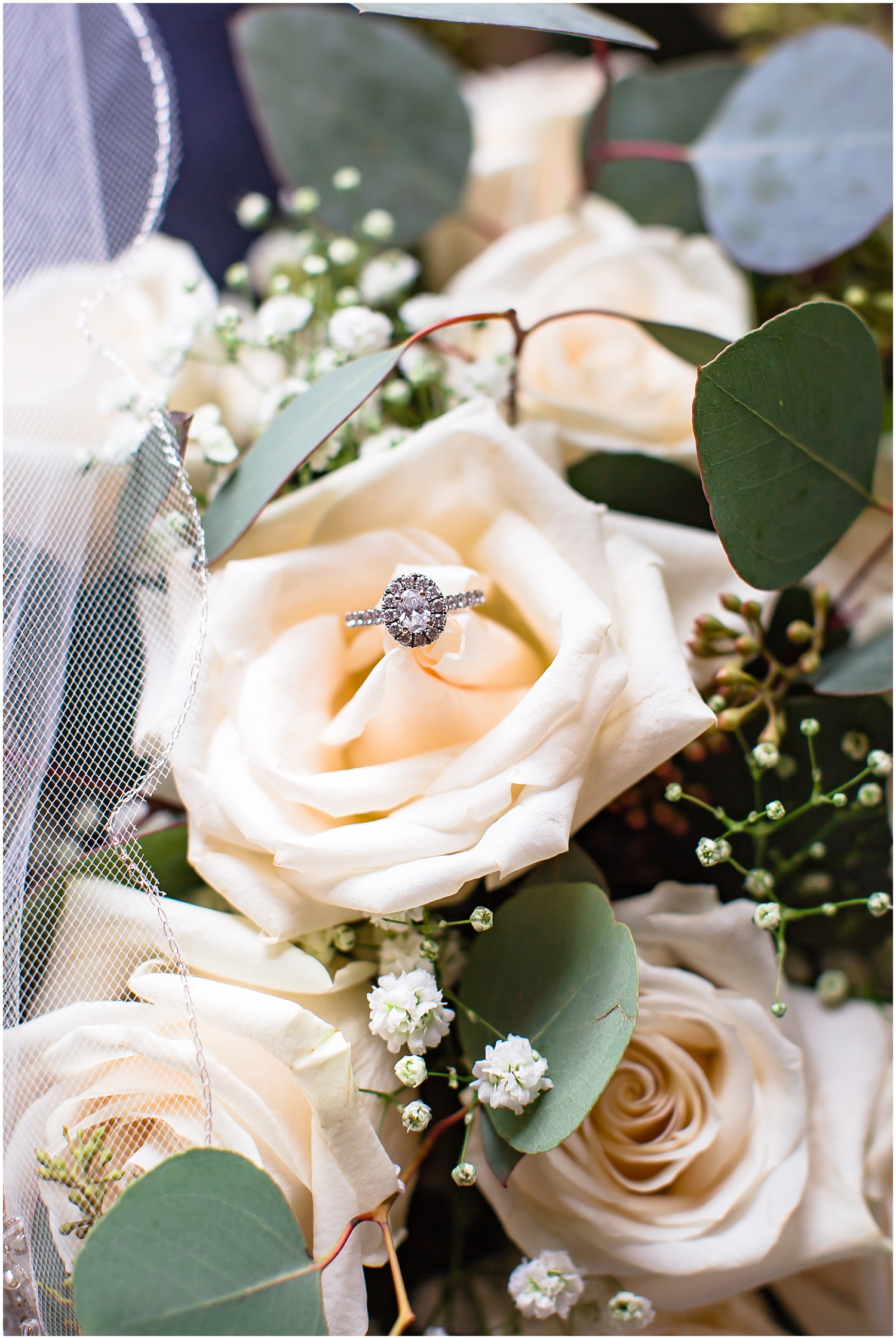  detail shot of the wedding bouquet and wedding rings 