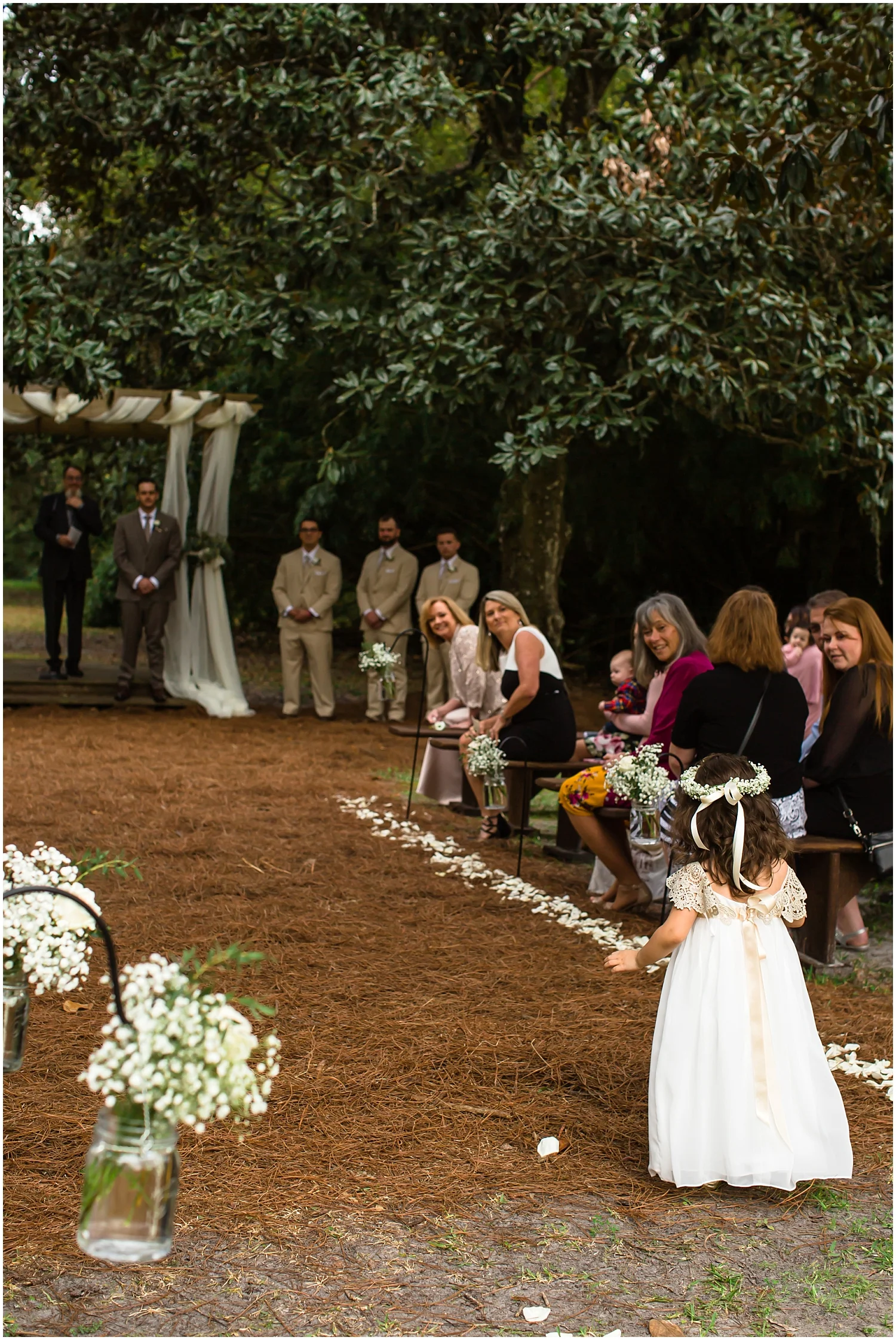  the flower girls walking down the aisle 