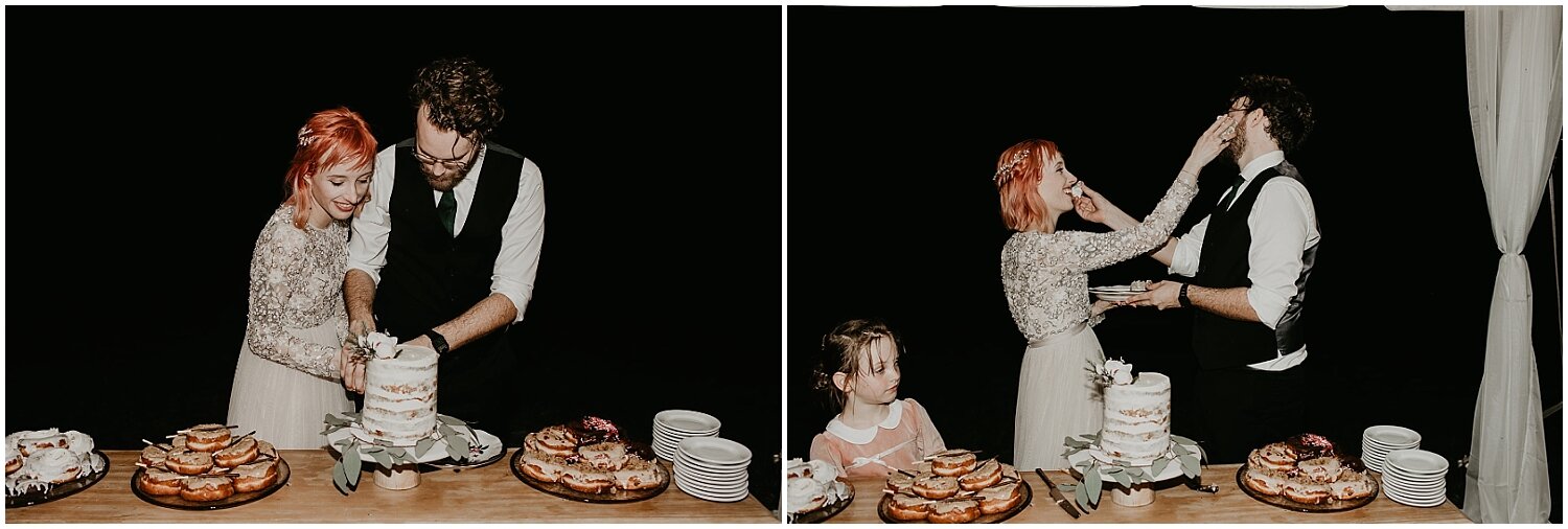  bride and groom cutting their wedding cake 