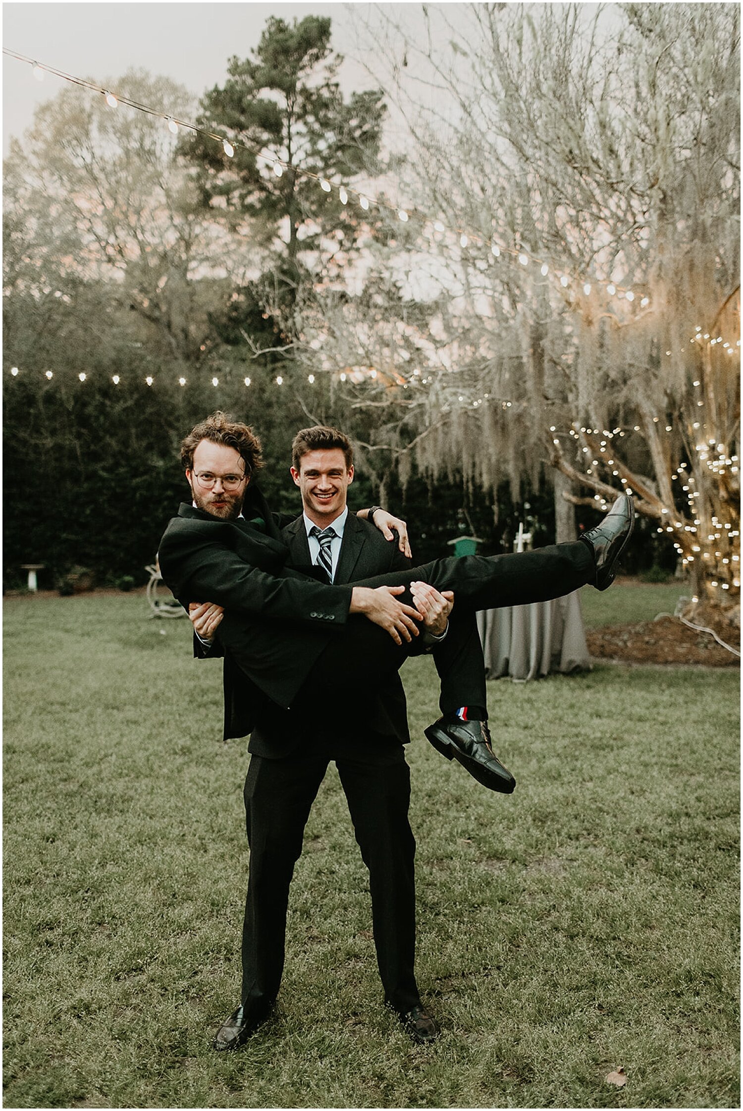  groom and friend being silly 