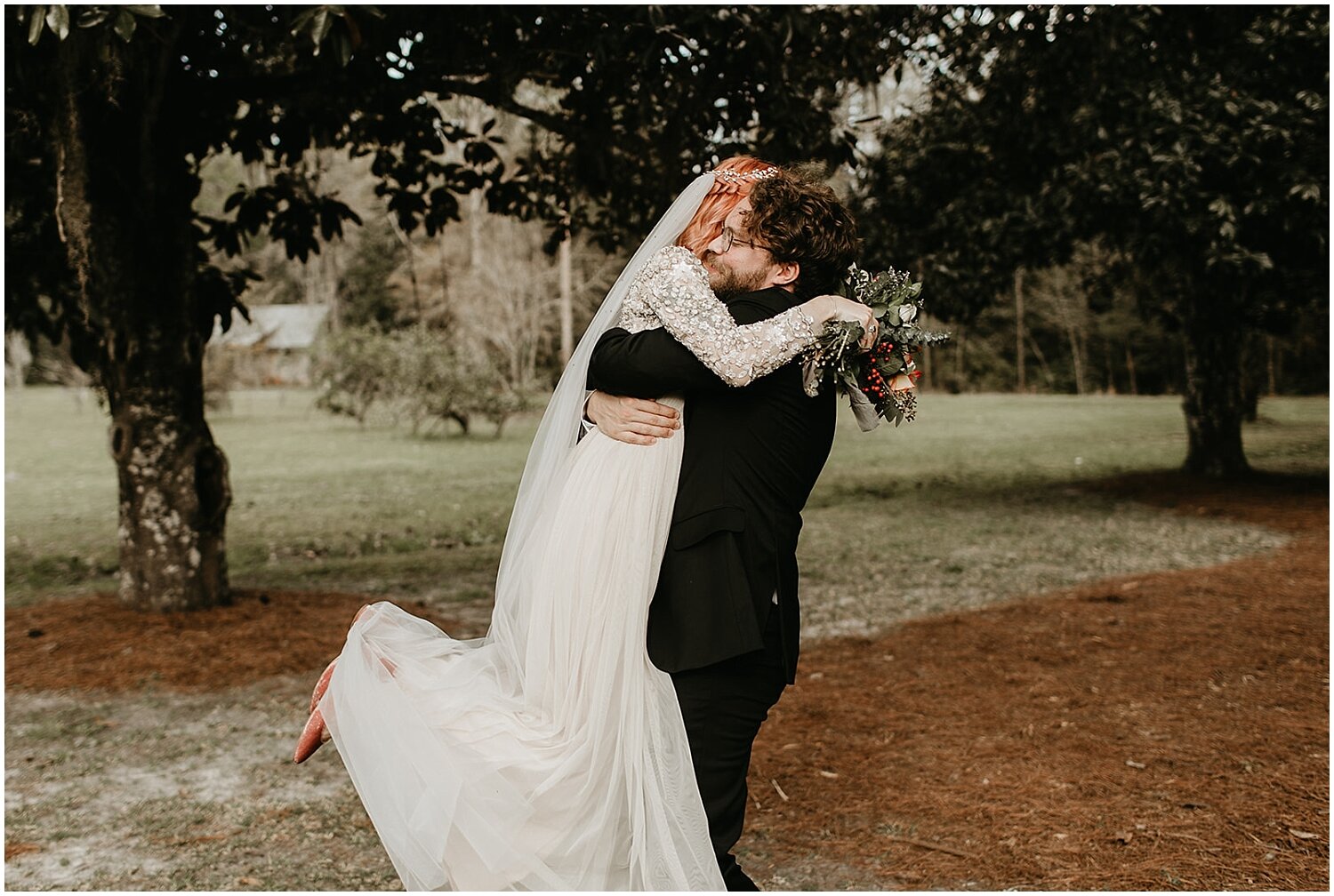  bride and groom hug at their wedding in Jacksonville 