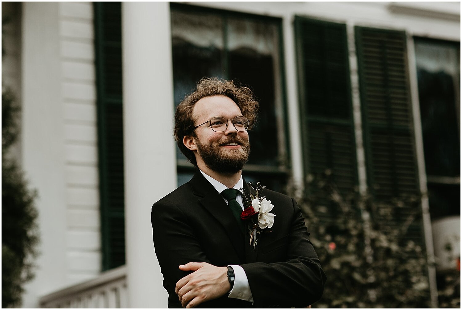  groom watching his bride walk down the aisle  