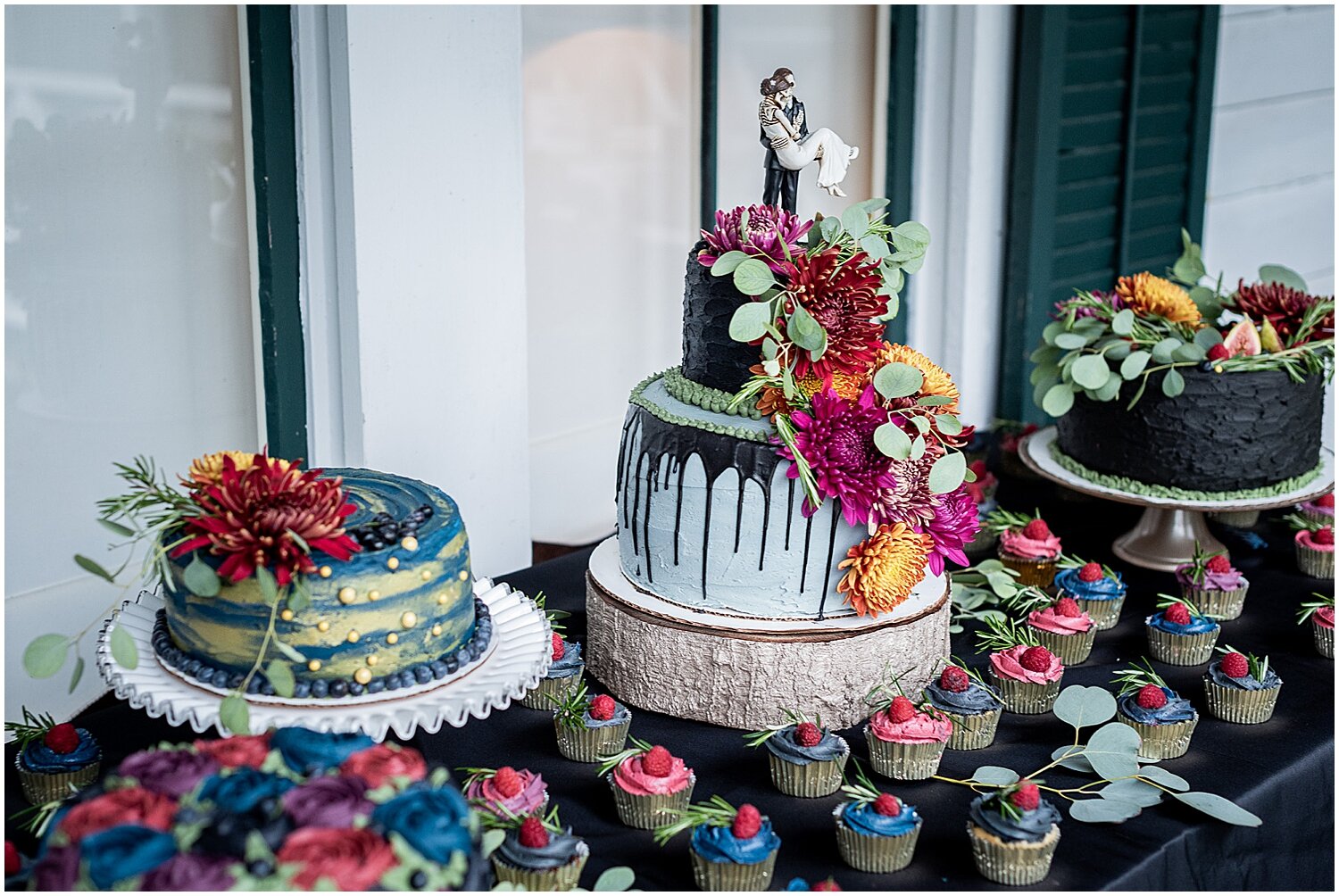  colorful wedding cake and dessert table display 