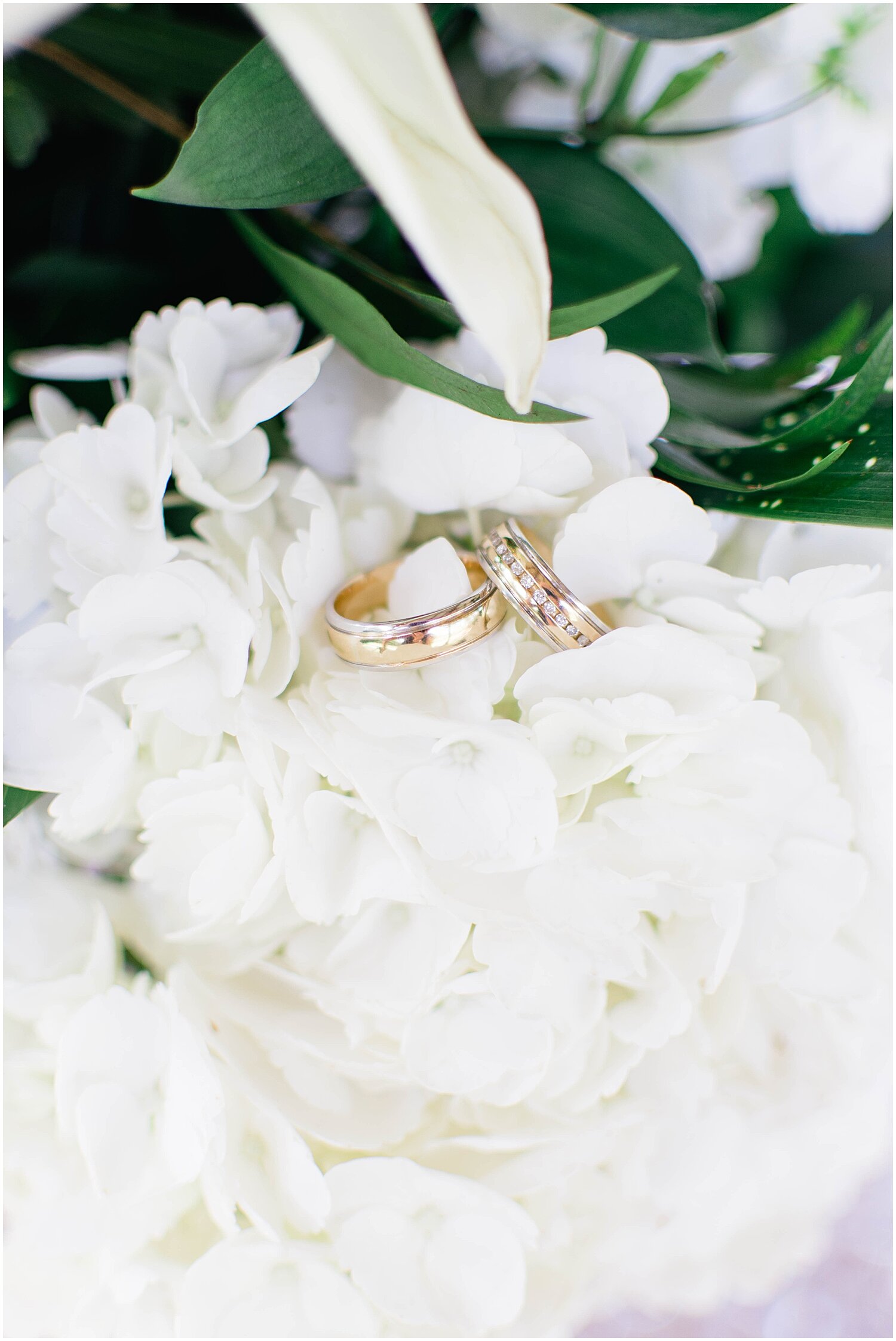  wedding bands and wedding bouquet 