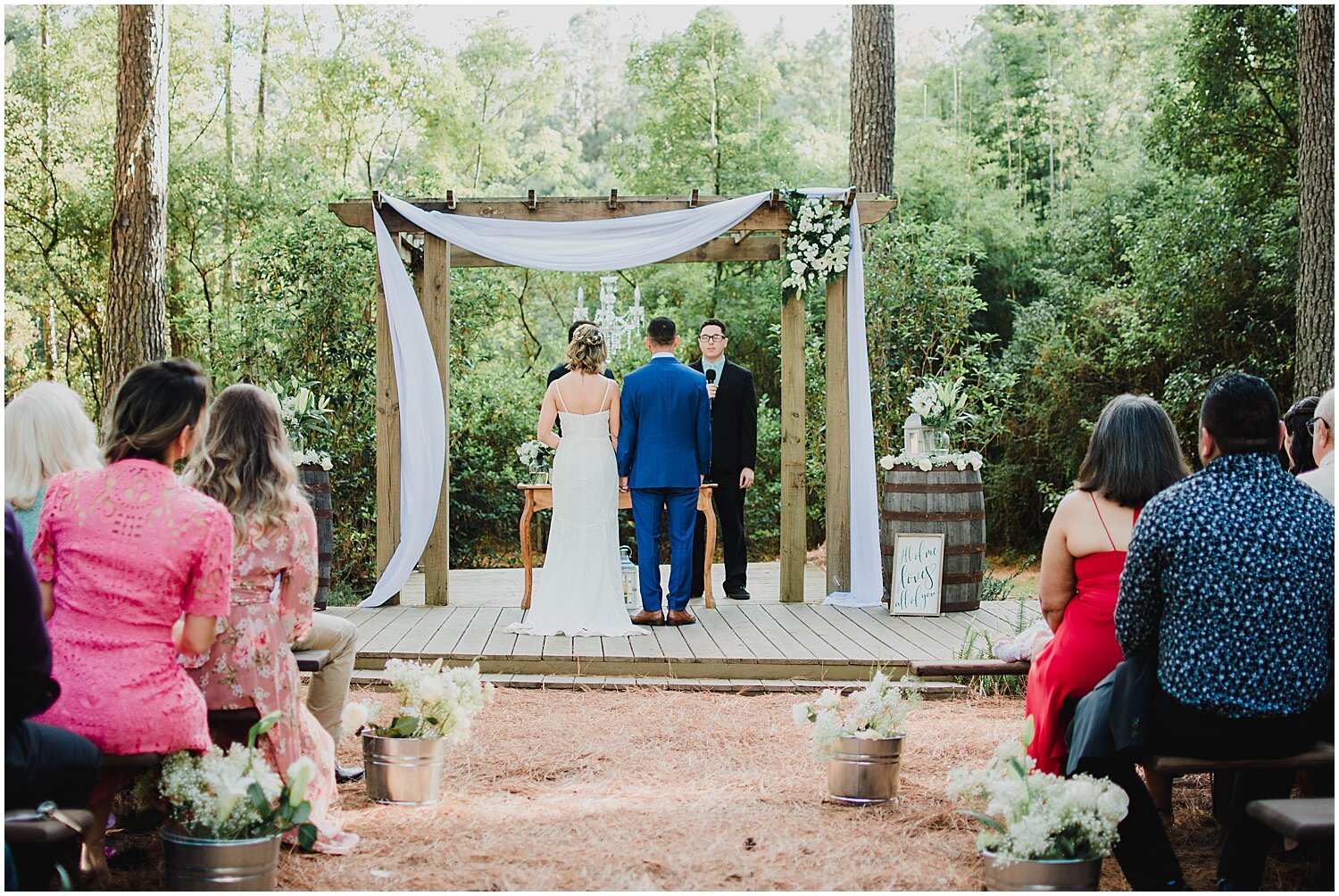  bride and groom during their outdoor wedding ceremony 