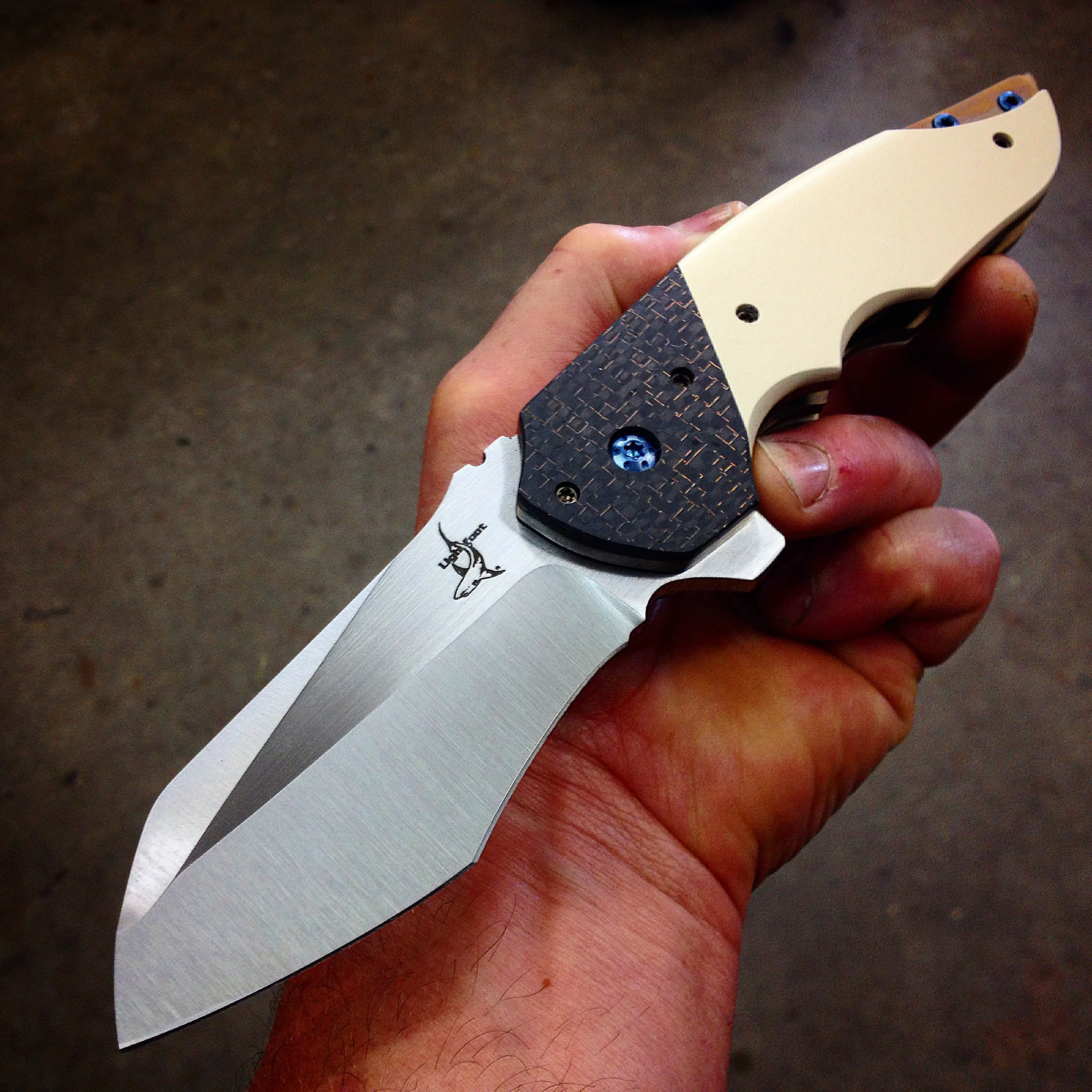 Gatekeeper with Micarta handles, lightening-strike carbon fibre, and satin blade