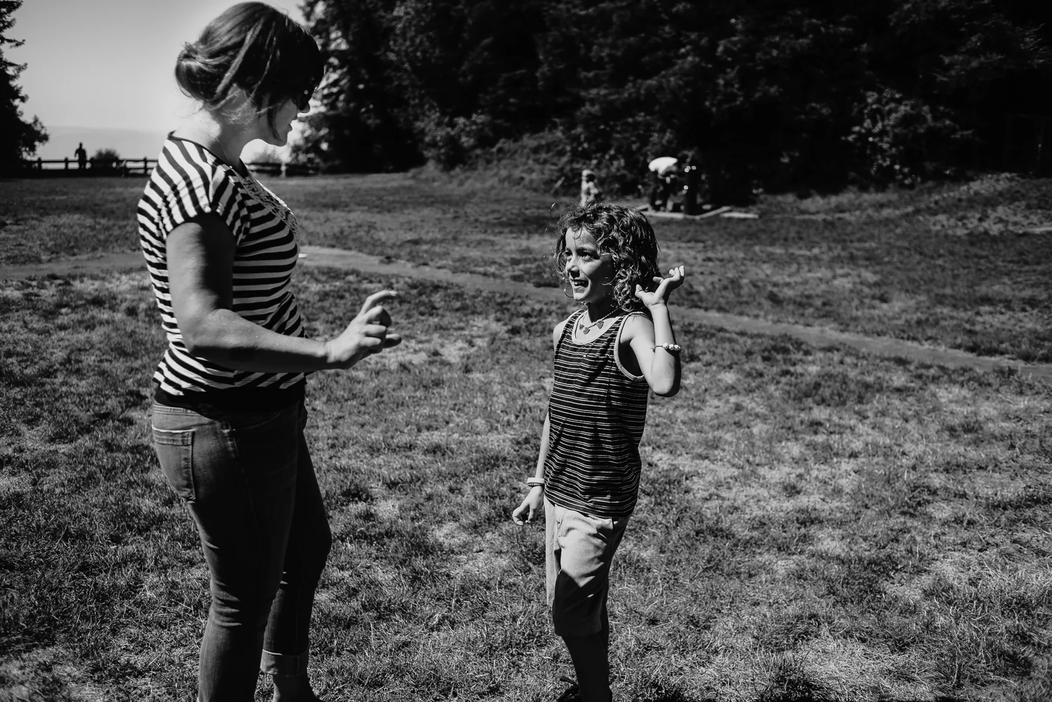Son shows mom how he pitches a curve ball