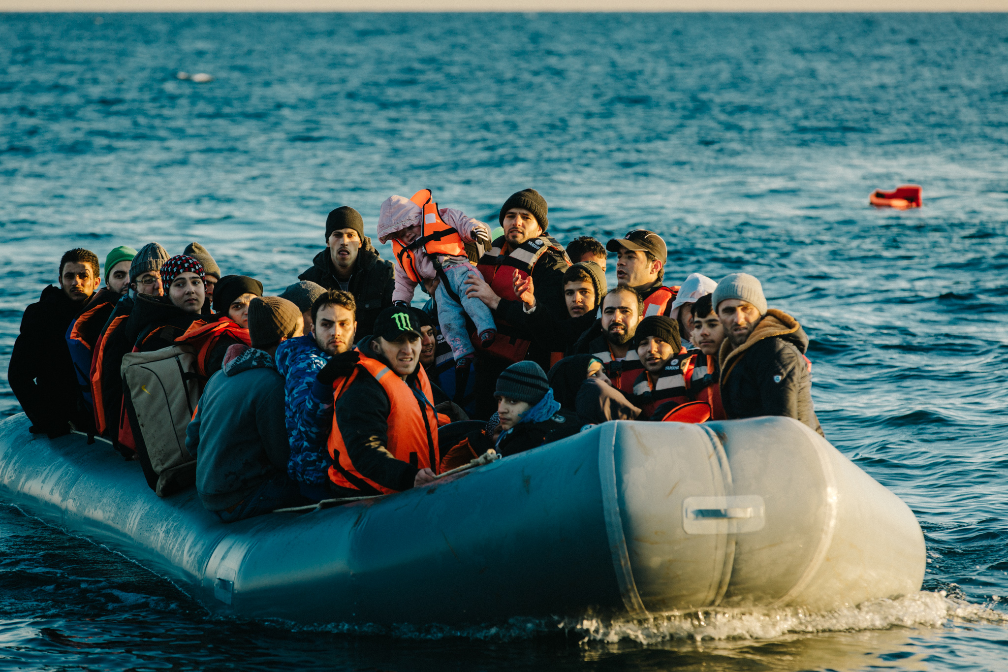 With weather on their side, a decent motor and less people than other boats, these refugees, mostly Syrian, complete their sea crossing in just under four hours.
