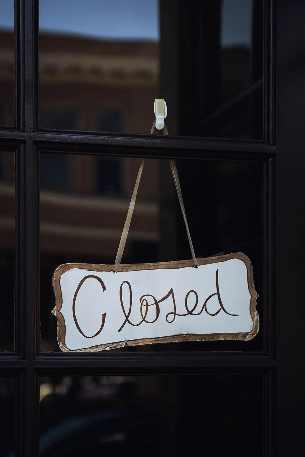 Closed sign, by Tim Mossholder