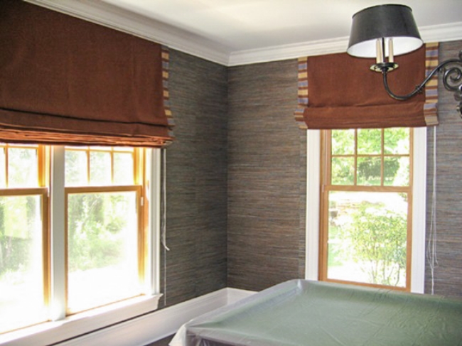 Billiard room's roman shades, with contrasting sides borders.