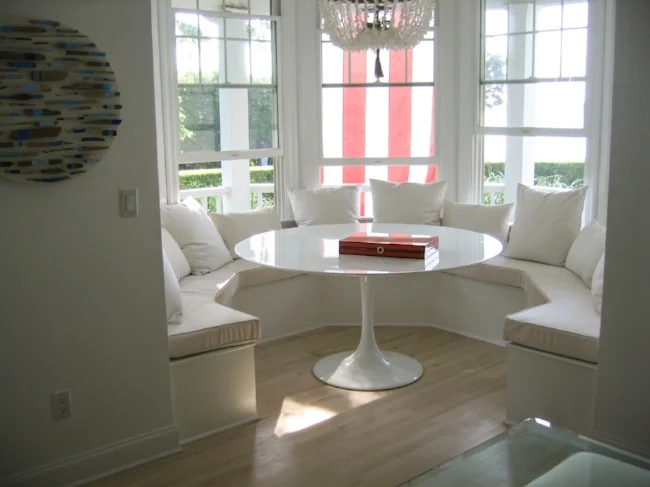 Bay window's cushions and throw pillows, all in Sunbrella fabric.