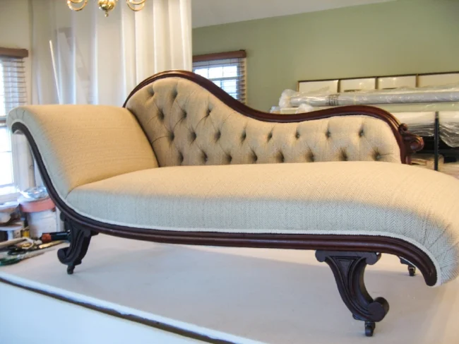 Tufted chaise re-upholstered.