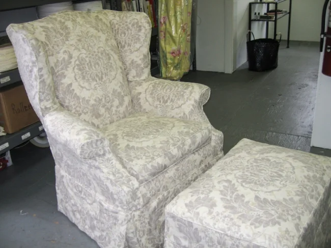 Wind chair and ottoman slipcovers in printed linen.