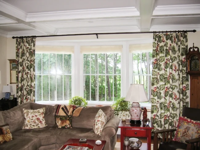 East Hampton residence living room's drapes and sheer roman shades.