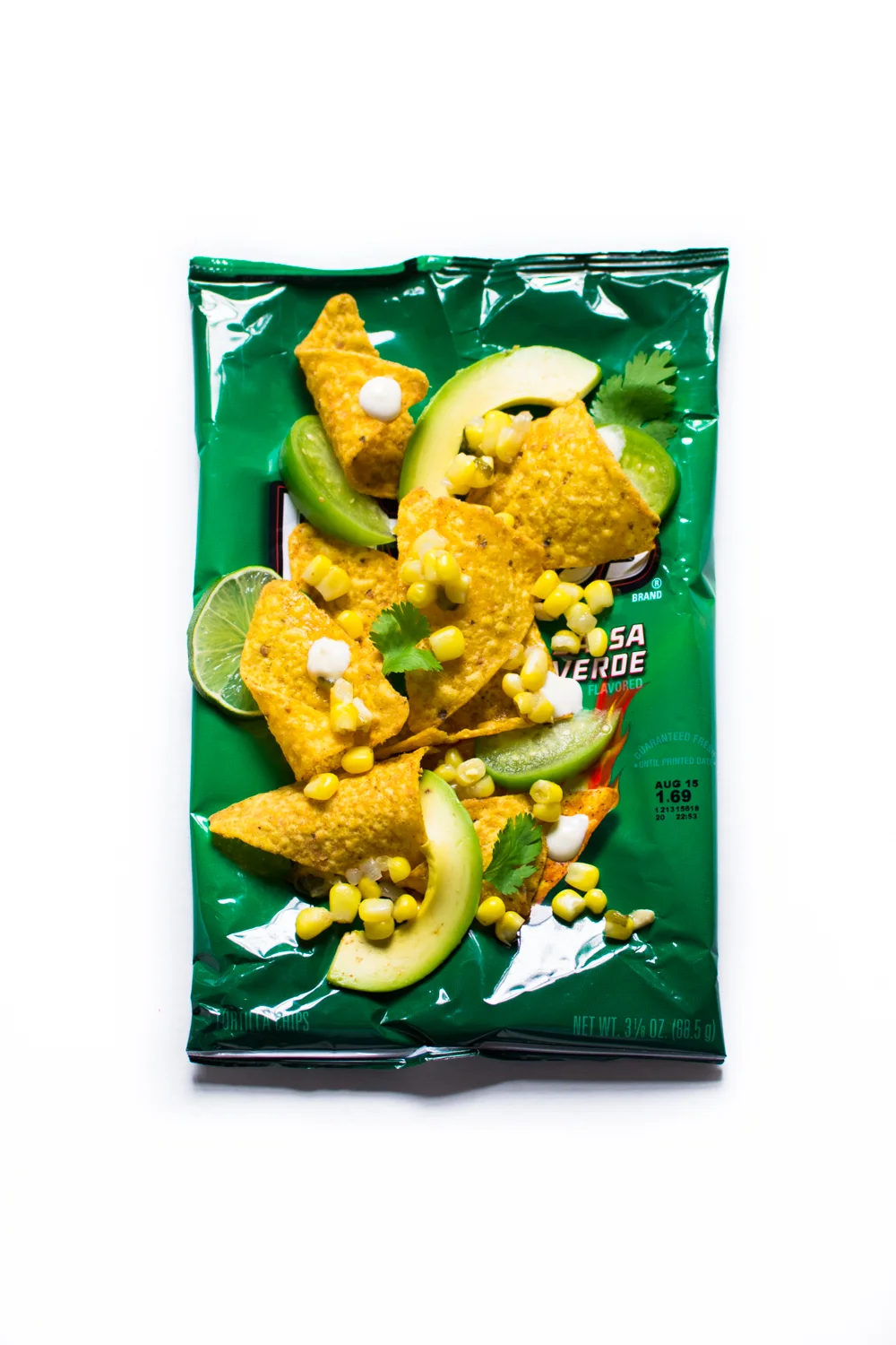 Salsa Verde Doritos, Avocado slices, Mexico City esquites, cilantro, lime mayo, raw tomatillo and lime. 