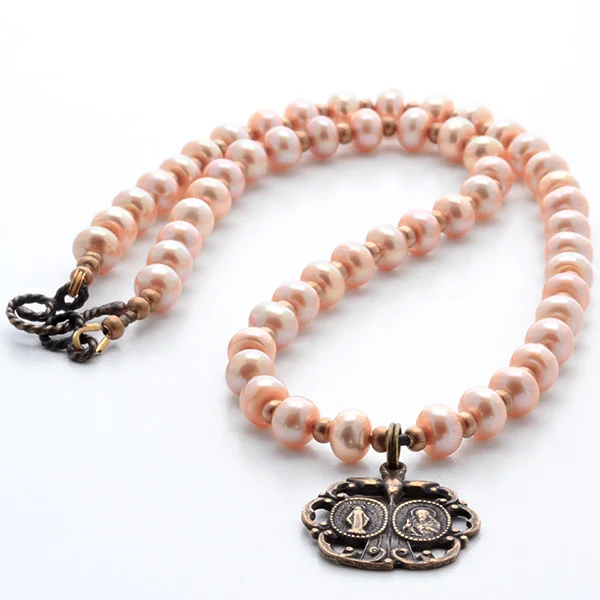 Necklace-MiraculousSacredOrange-Open.jpg