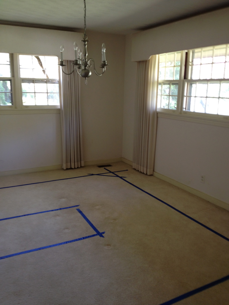  Before. We took this original dining room to be part of the new kitchen. You can see where the new island will be.