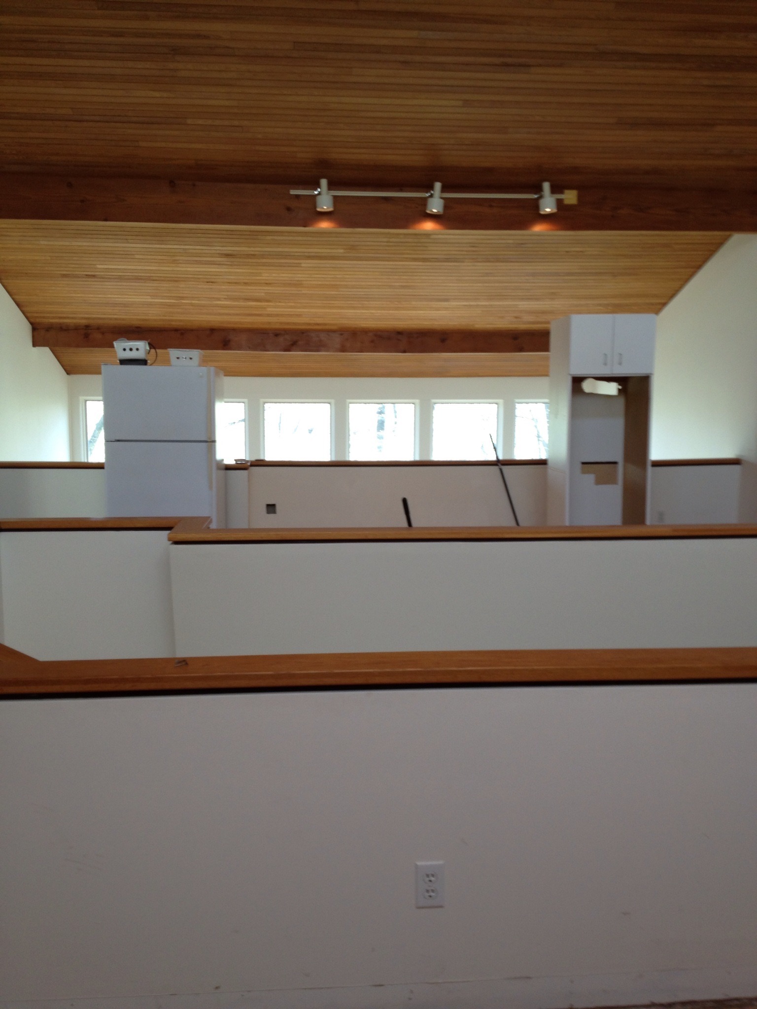 Before. Refrigerator and discarded cabinet were temporarily stored here while we remodeled the the adjacent kitchen.