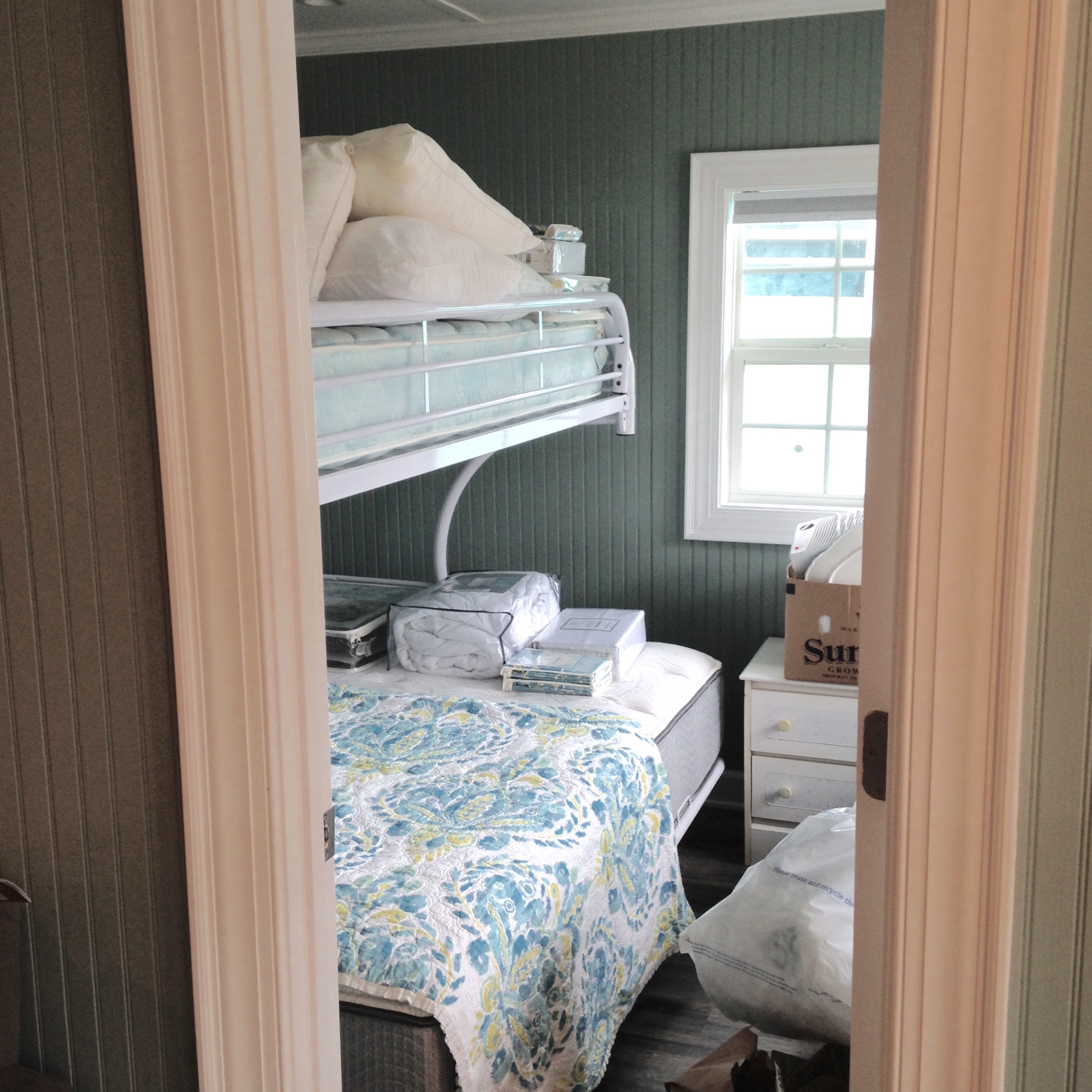 Staging the front bedroom.
