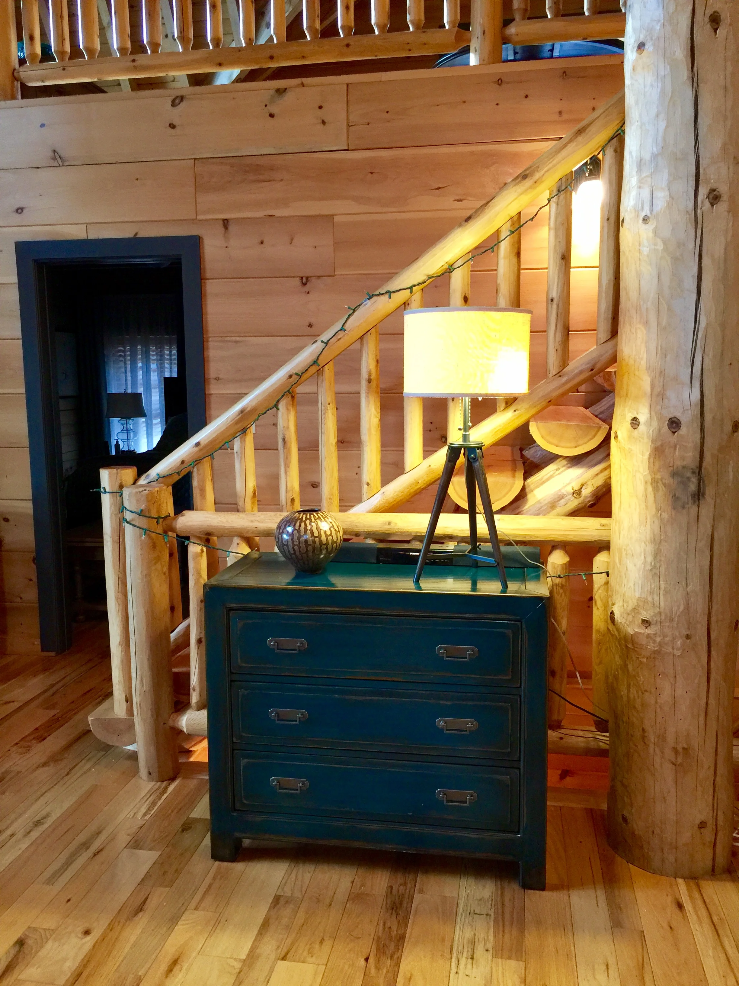 Beautiful teal chest with distressed finish adds a pop of color.