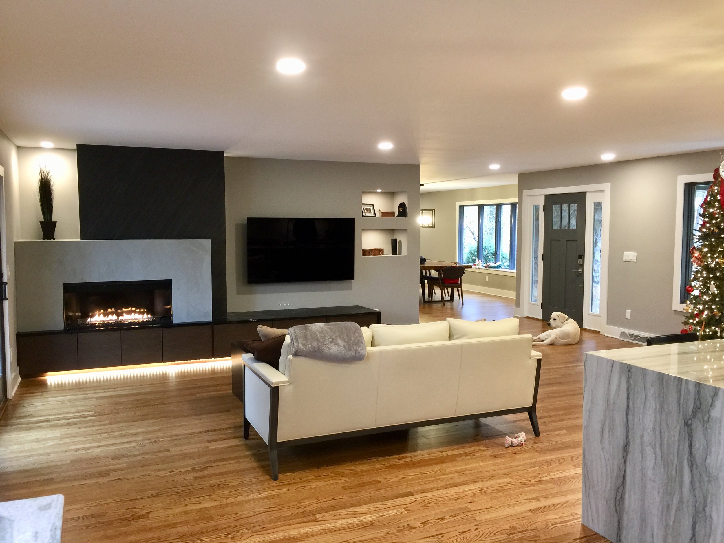 We also designed a focal wall for their fireplace and television with a couple of recessed niches for special treasures.
