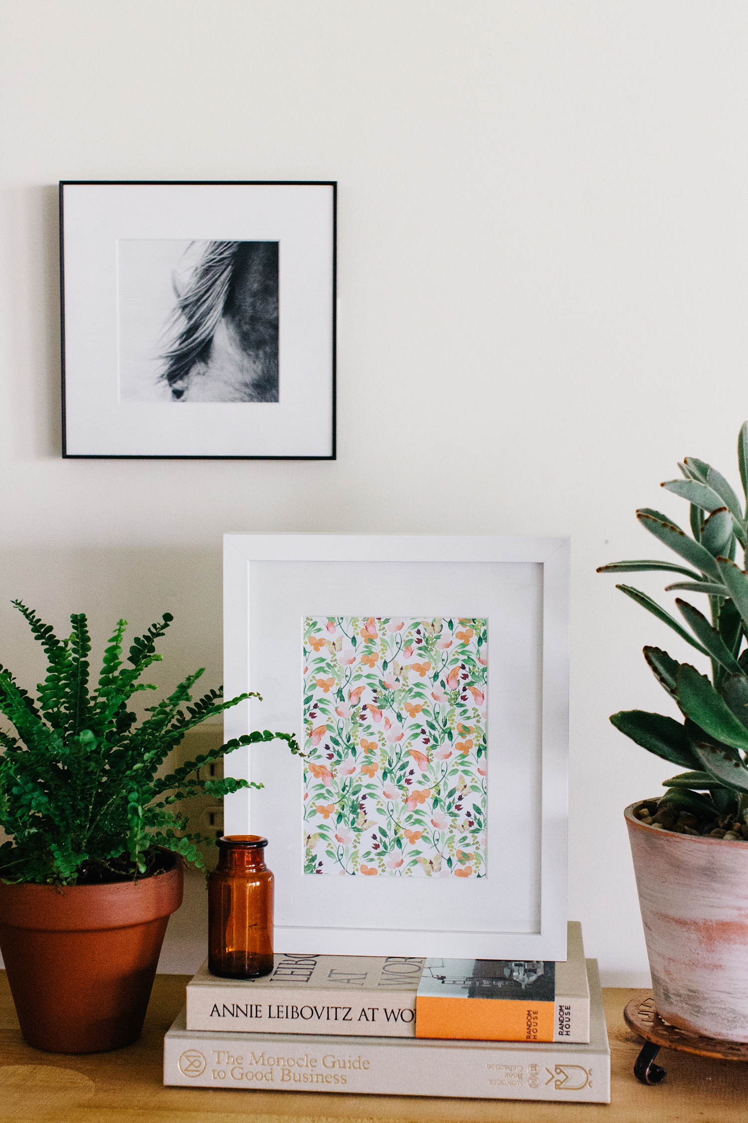 Stacks of books and art.