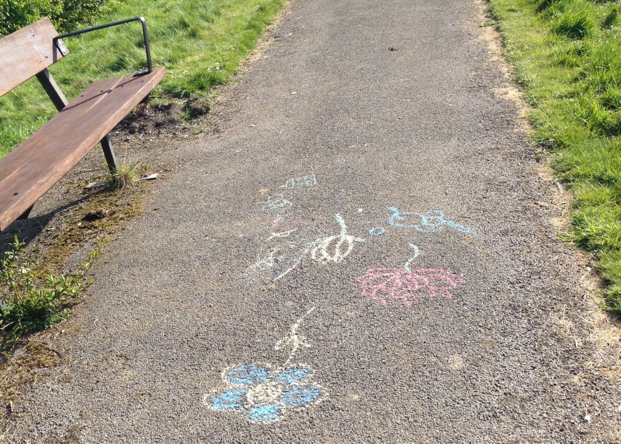 Restored bench with new armrests - and some chalk artwork