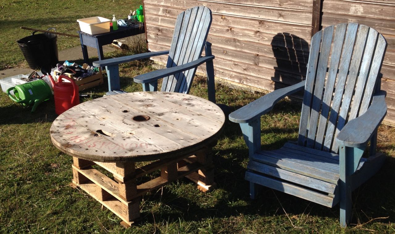 Bits of pallet we couldn't use for anything else and some tops from cable thingies. We are trying to use up the wood supplies!