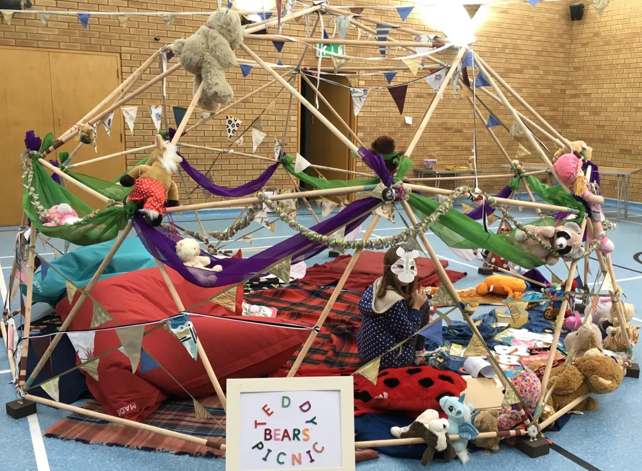 September update: so we painted stripes on it and decorated it for the Queen Edith’s Share Fair, which we had to do inside a local sports hall because rain was forecast. Thanks to Emma, Sophie and Lucy for the exuberant and joyful decorations, including tiger disguise masks.