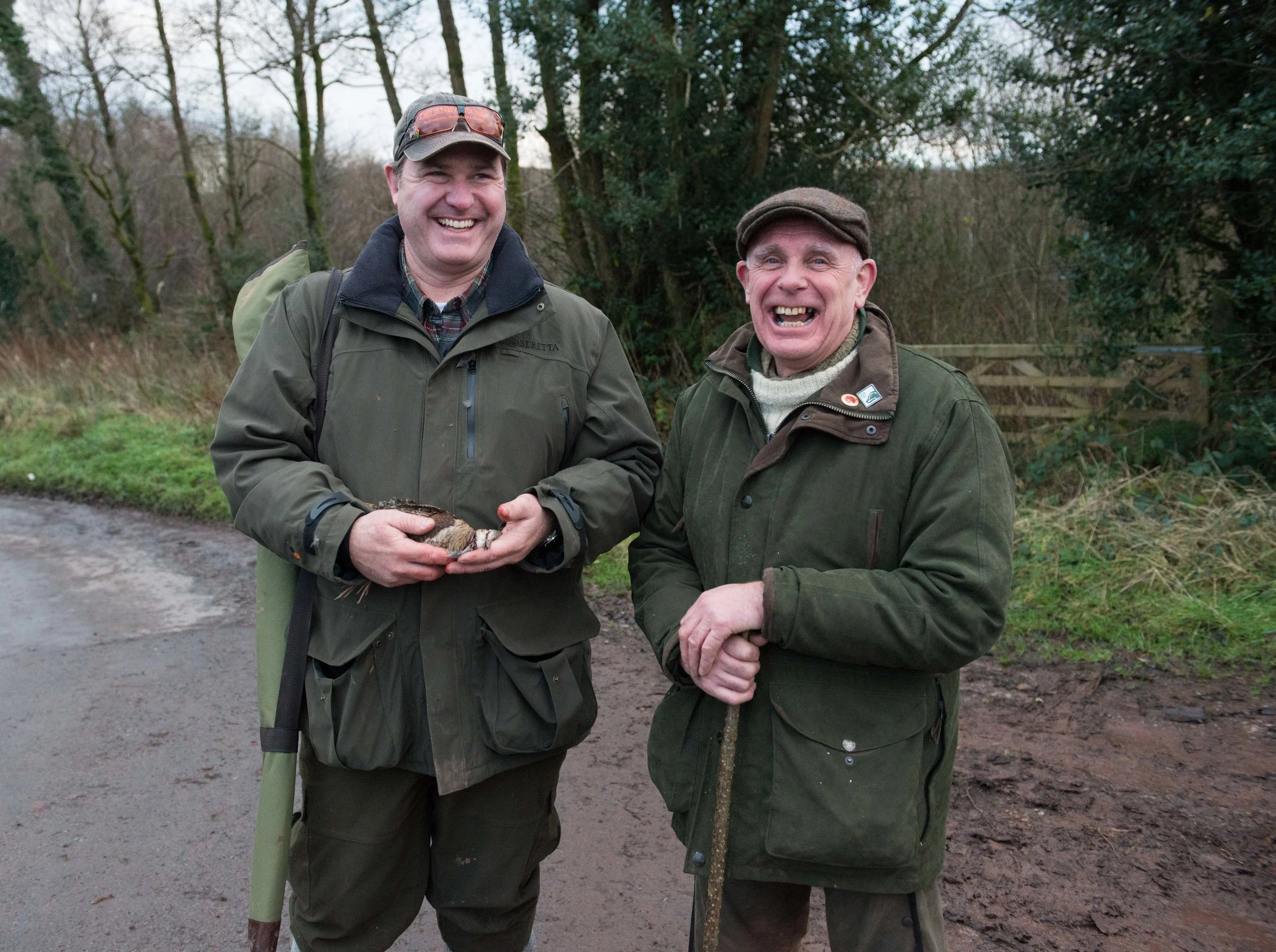 Sean holds his second woodcock to date next to beater, Steve.