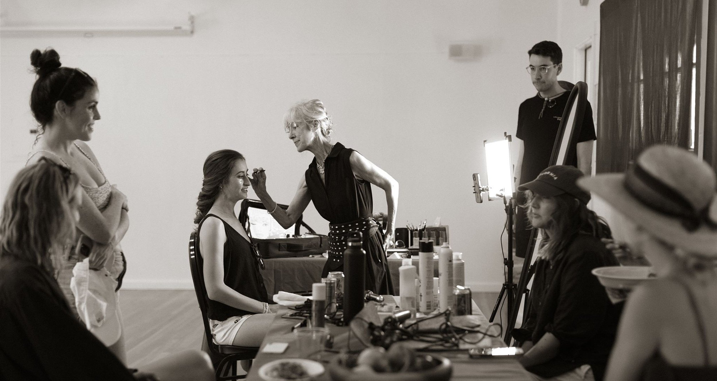 Bridal hair makeup artist Rebecca Beardsley applying natural bridal makeup