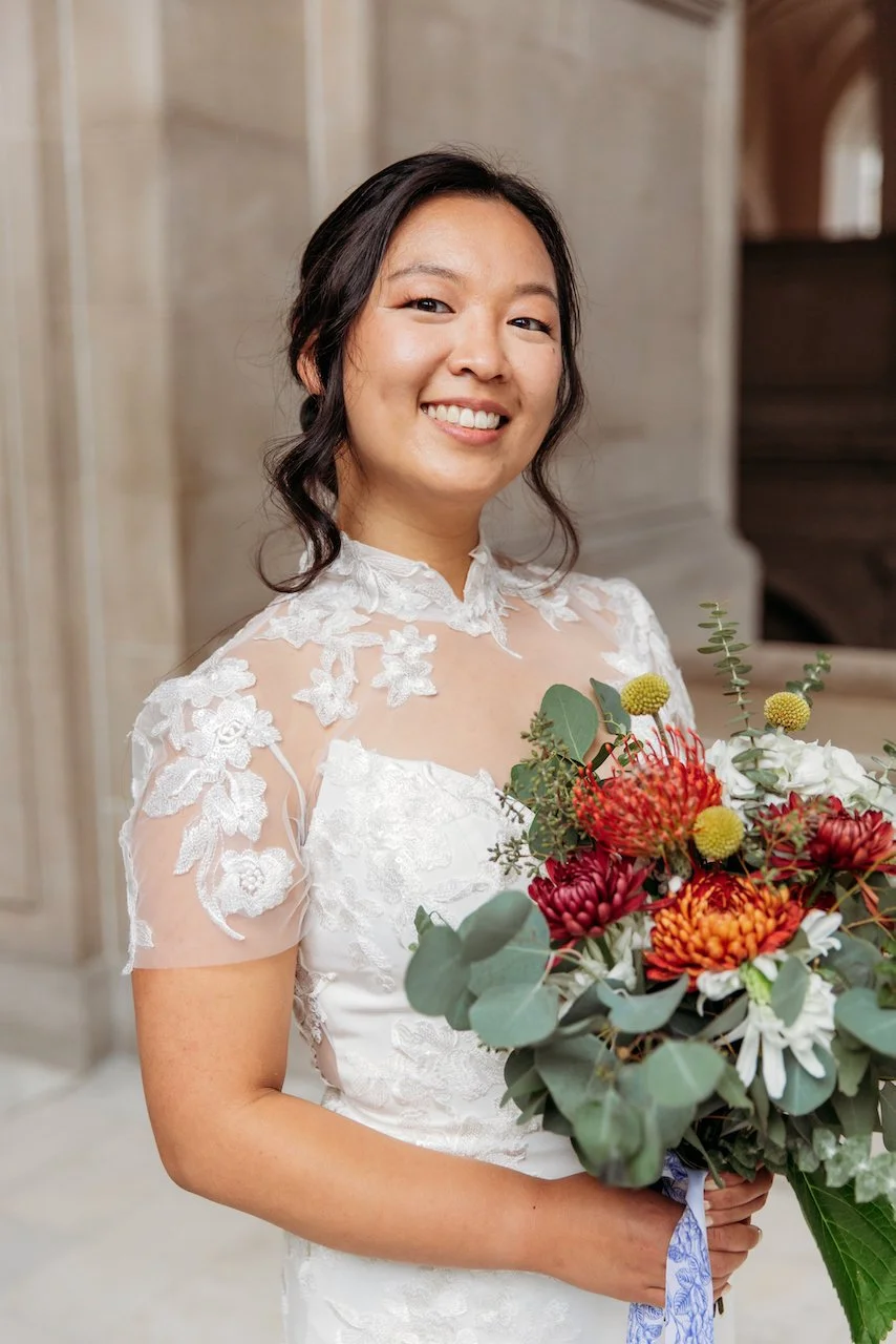 an  Francisco City Hall bride wearing soft, natural bridal makeup and hairstyle by ShineForth Beauty.