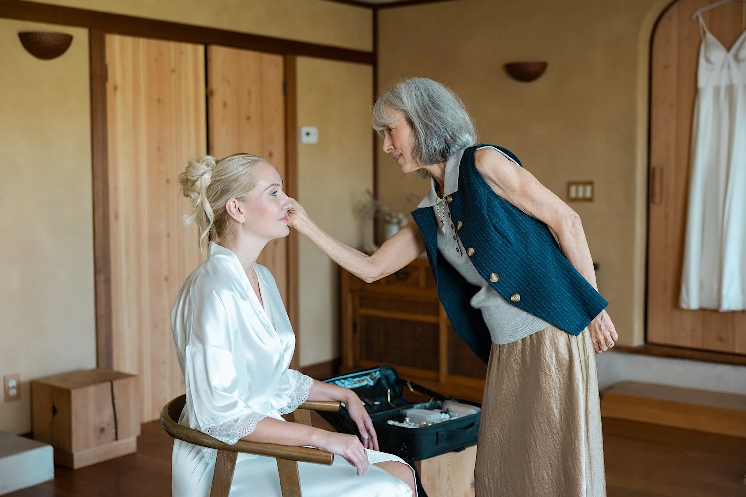 Behind the scenes of Reecca prepping a bride's skin on her wedding day