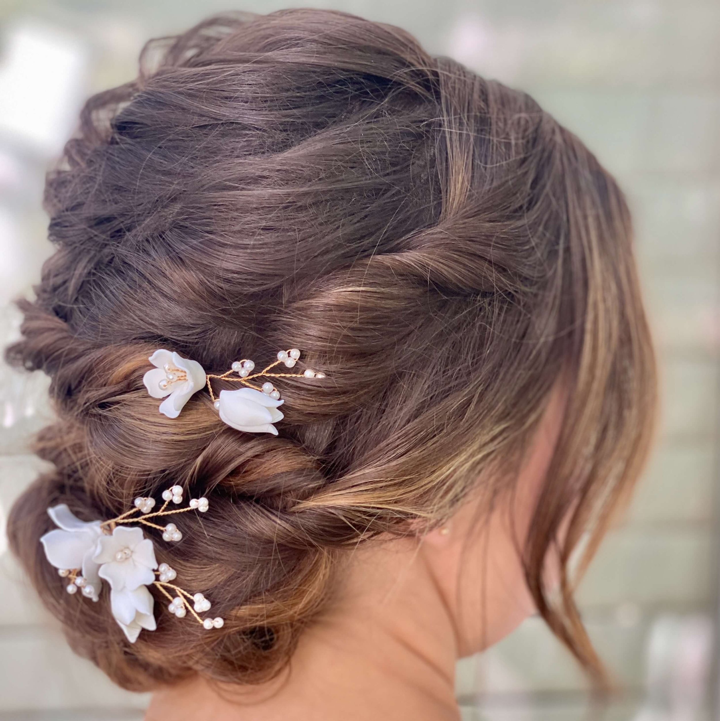 Soft Bridal updo with flowers ShineForth