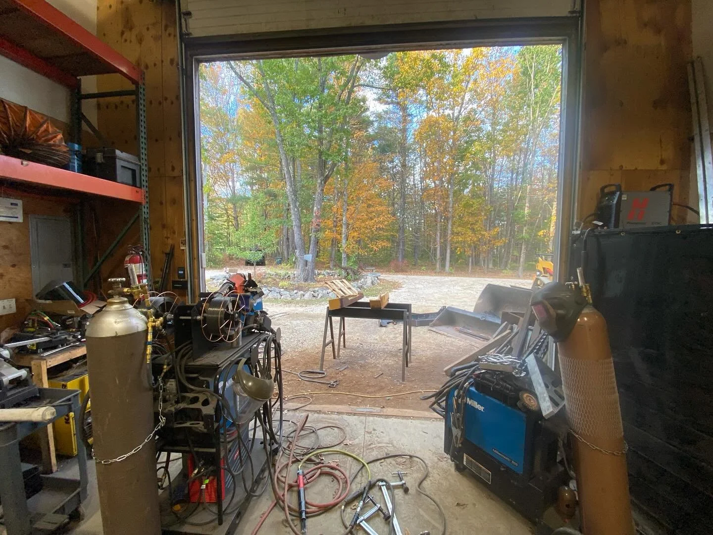 Office view today, October in Maine. 80 plus degrees today. Re-skinning snow pusher shoes with AR450. Most of my jobs going on right now are my customers prepping for winter. #weldingrepair #airarc #welder #welding #shopwork #millerwelders #weldingre